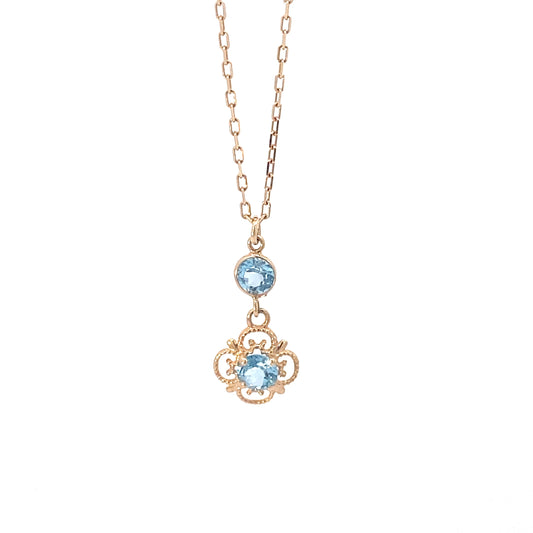 14K Yellow Gold Swiss Blue Topaz Flower Pendant